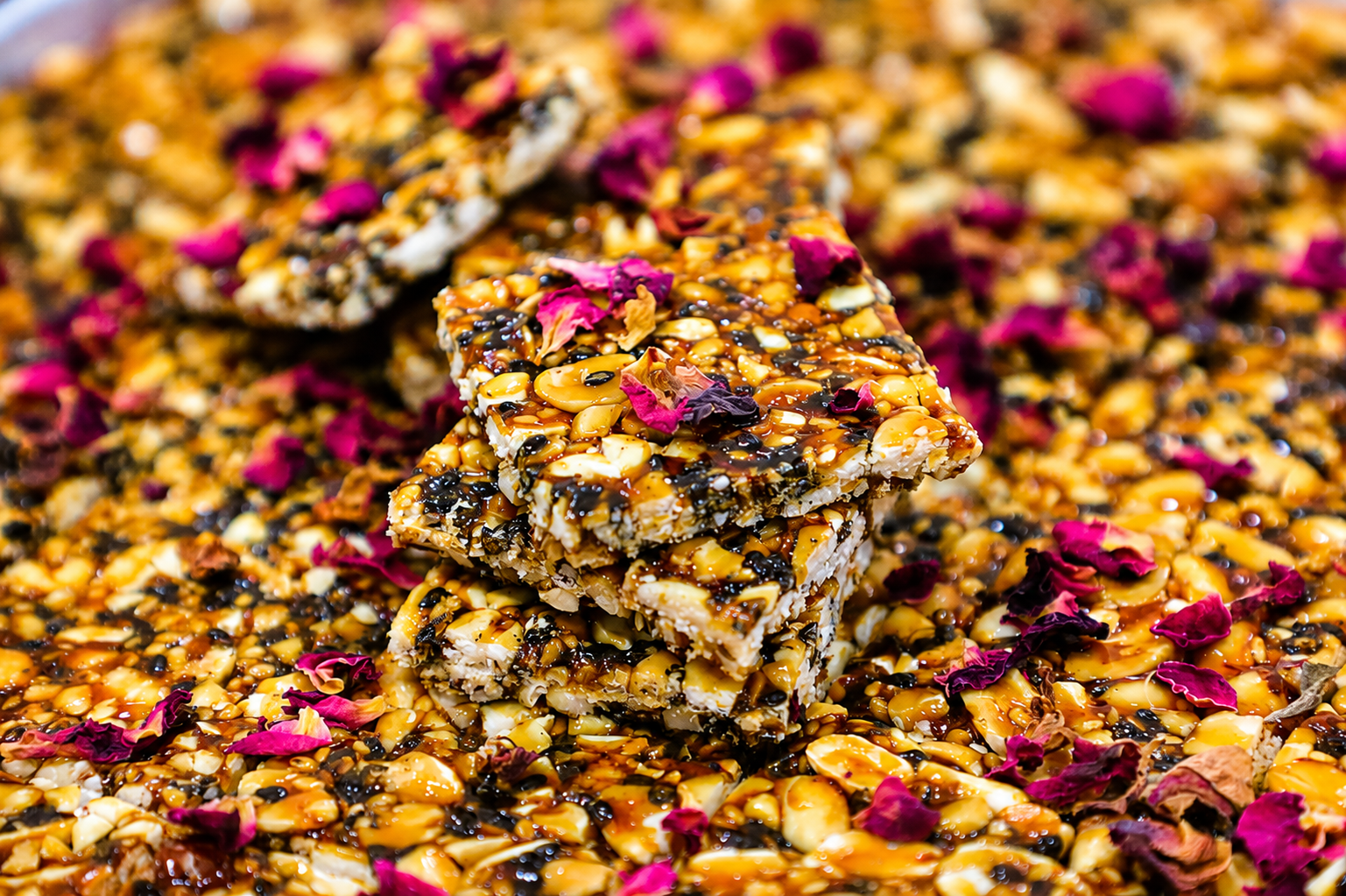 Mixed chikki bars with rose petals